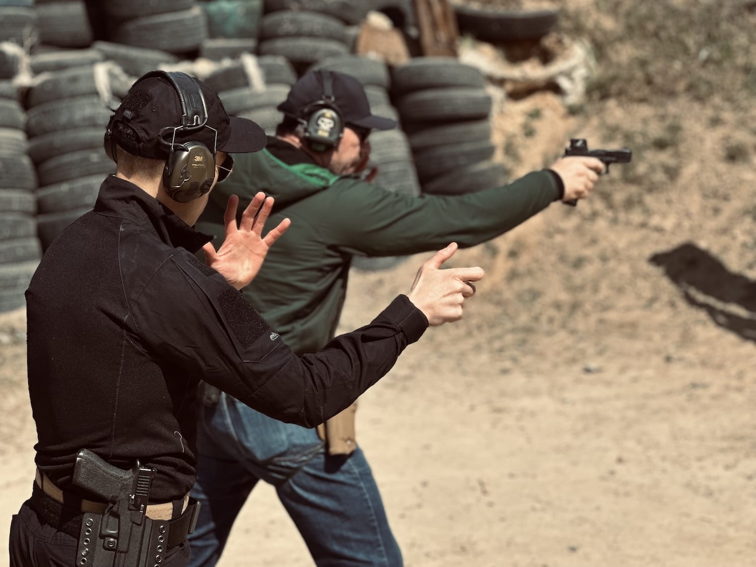 Dynamic pistol shooting drills at Warsaw Tactical training facility Poland