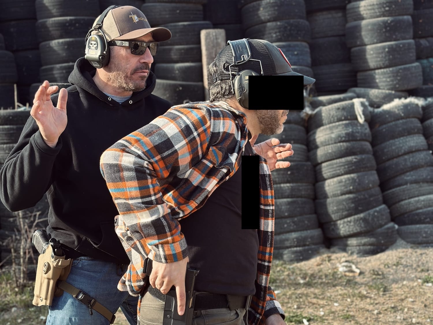 Tactical firearms instructor demonstrating CQB techniques Warsaw Poland