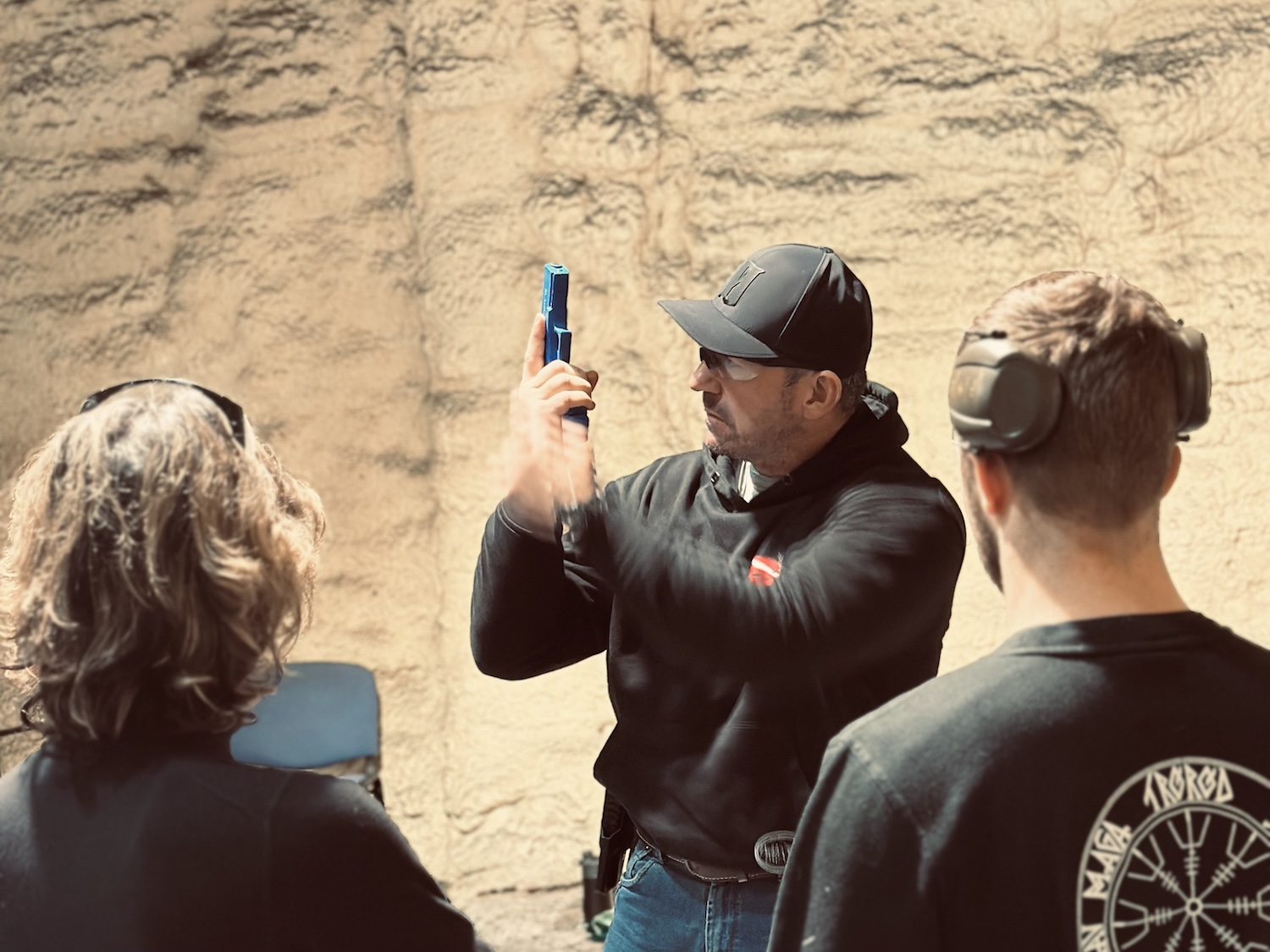 Dynamic pistol shooting drills at Warsaw Tactical training facility Poland