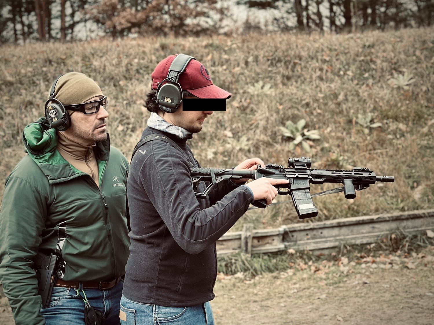 Tactical firearms instructor demonstrating CQB techniques Warsaw Poland